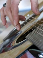 Strumming guitar